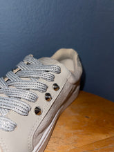 Gray and white glittery shoe